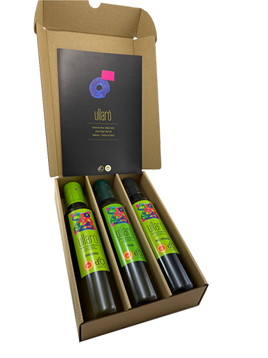 Imagen de varias botellas de aceite en una caja de cartón